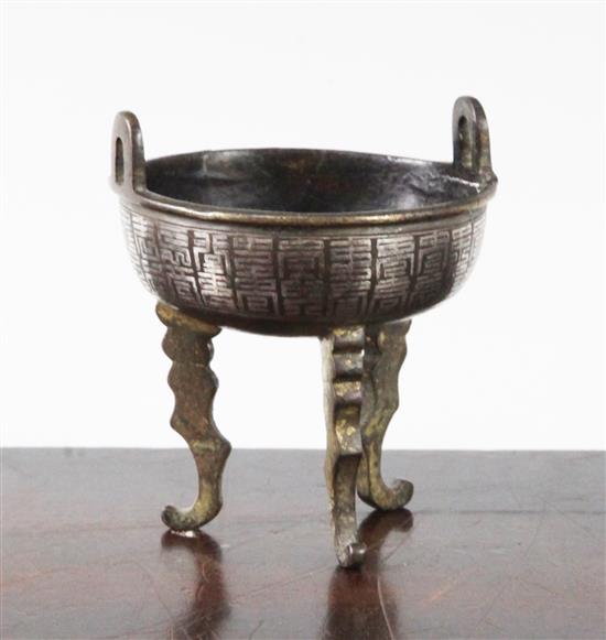 A Chinese bronze and silver inlaid tripod censer, 18th/19th century, height 7.5cm, split to rim